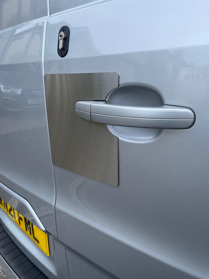 Stainless rear door Transit Custom latch shield fitted by Vanlocker